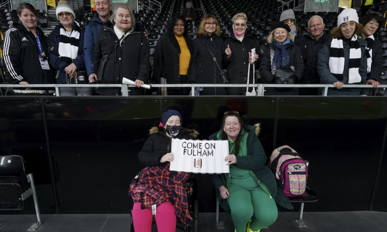 Age UK group and FFC and Trust staff sitting in the Riverside stand pre-kick off at Huddersfield