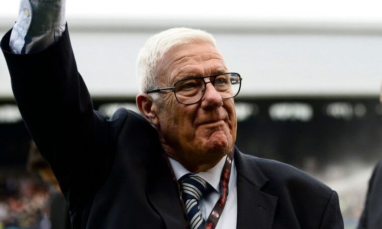 Fred Callaghan face shot with hand raised waving to the Fulham crowd (out of shot) when recently on the Craven Cottage pitch in 2018