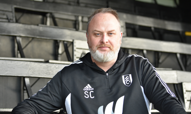 Headshot of new Academy director in the stands at Motspur Park, Fulhams training facility.