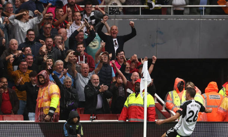 Joao Palhinha celebrates his late leveller at Arsenal in August 2023 with the Fulham fans